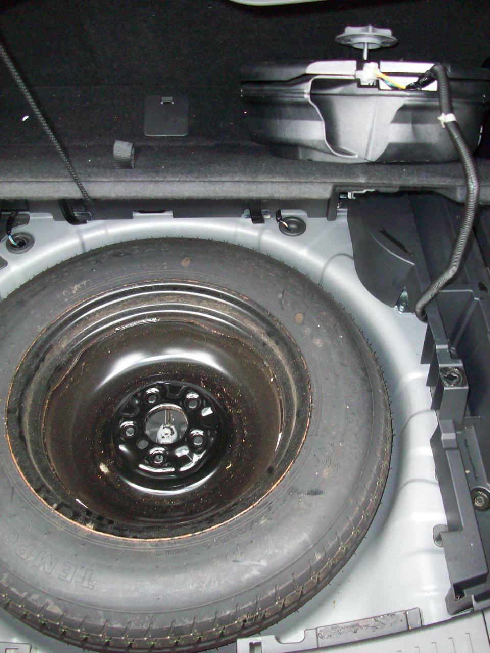 How to remove spare tire nissan quest